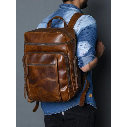 Godzi LeatherLyric Express Backpack shown in rich brown leather, designed for style and durability.