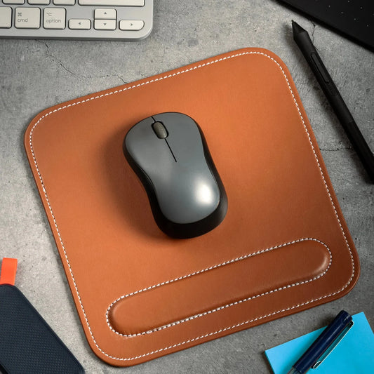 Leather Mouse Pad with Wrist Rest (set of 2) featuring a smooth surface and integrated wrist support.